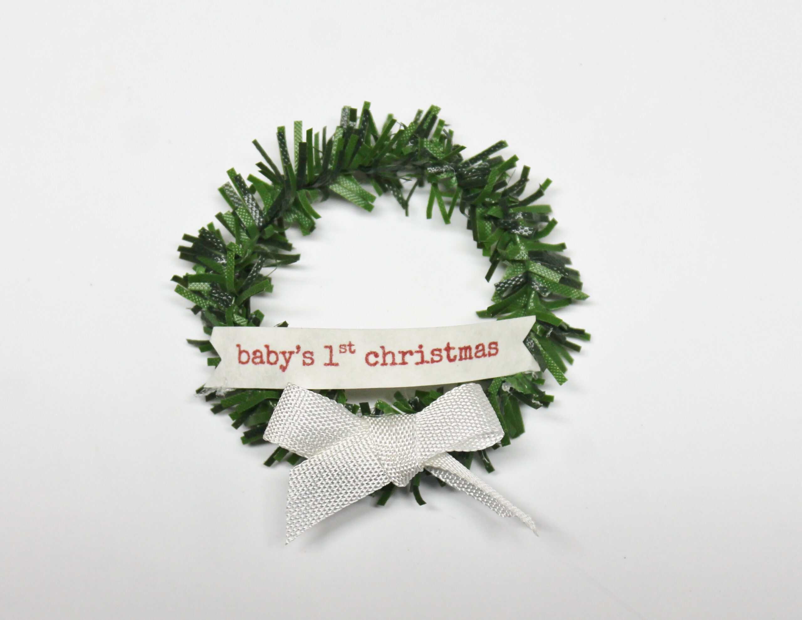 mini wreath with "baby's 1st christmas" tag