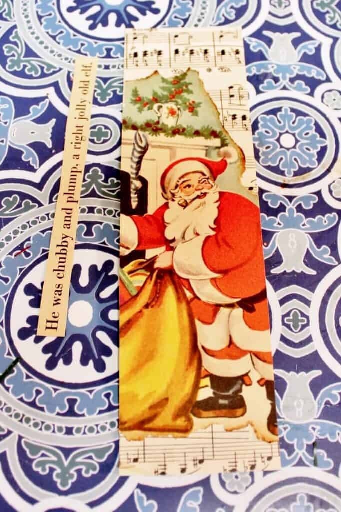 Santa illustration glued on top of vintage music paper on bookmark