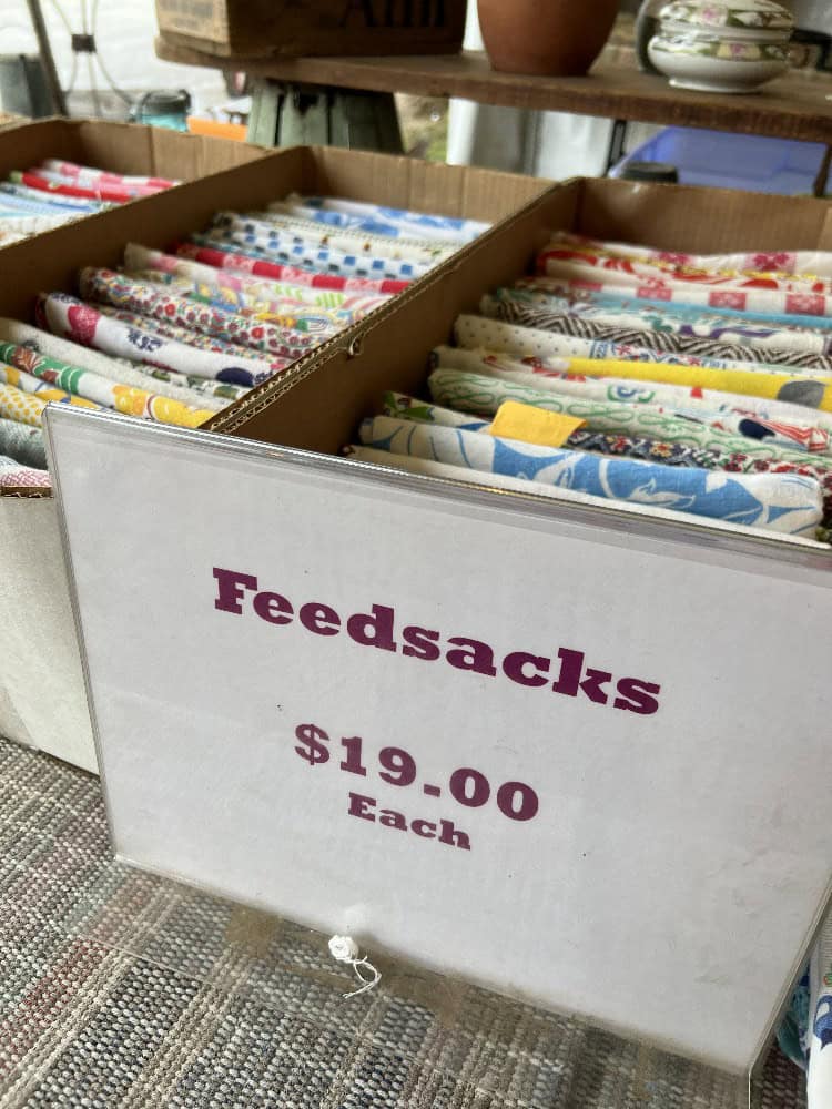 Boxes of feed sack fabric for sale for $19 each