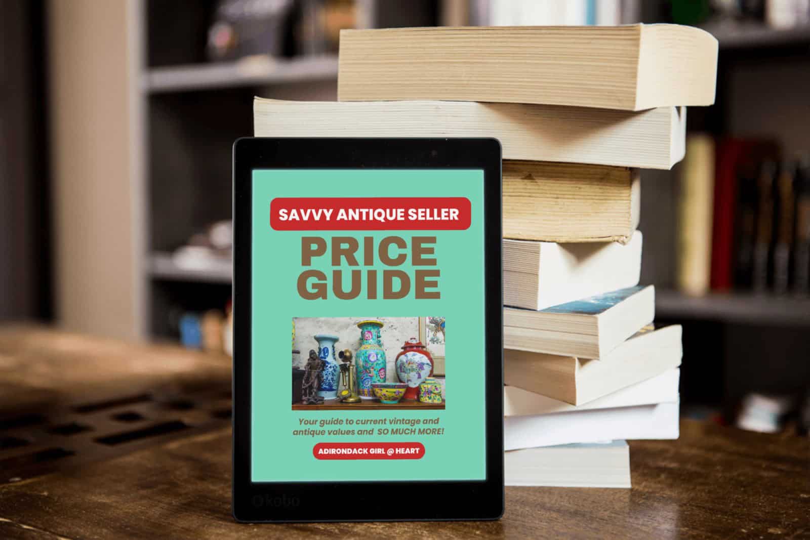 Savvy Antique Seller Price Guide on ipad in front of a book stack