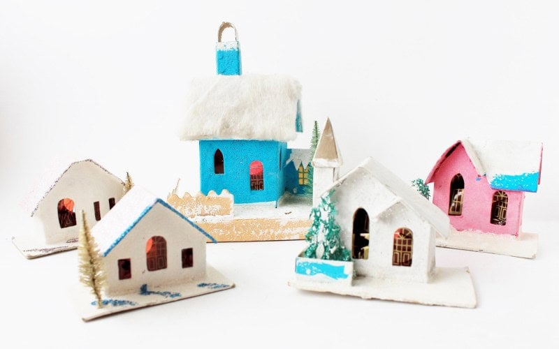 5 Putz houses including blue, pink, and white ones