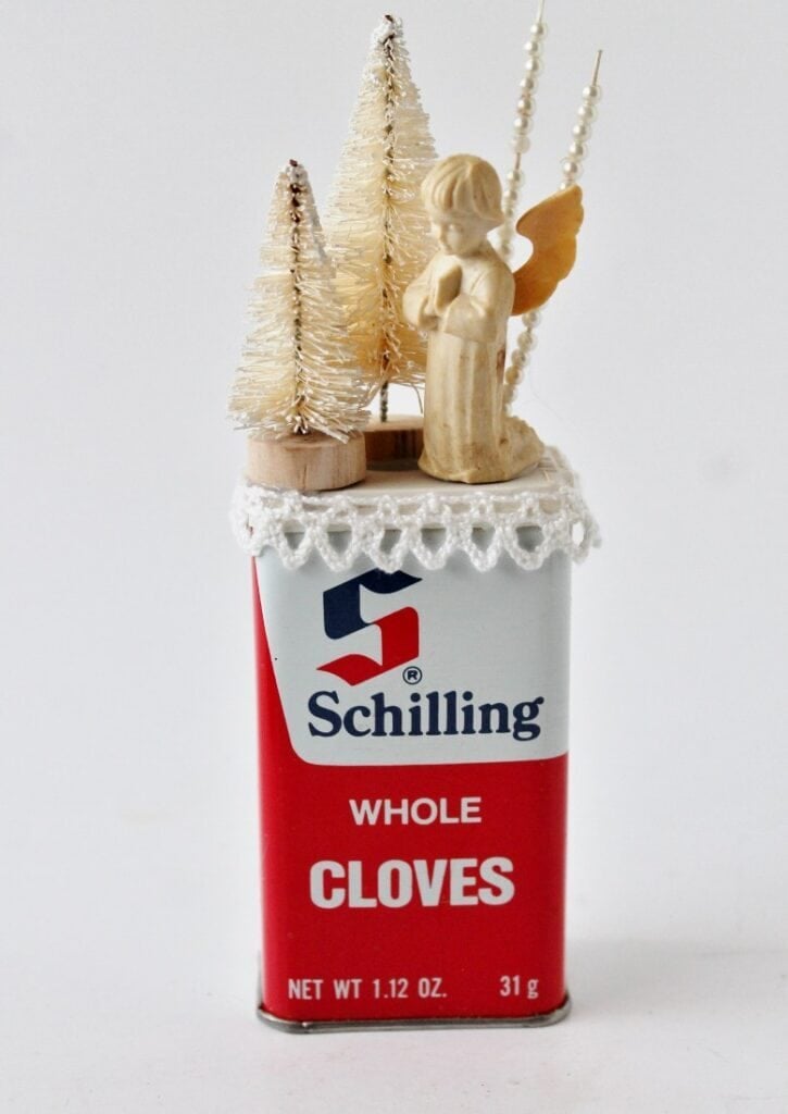 vintage clove spice tine with angel decoration