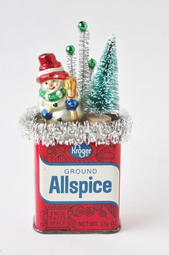 Vintage allspice tin with christmas scene/diorama