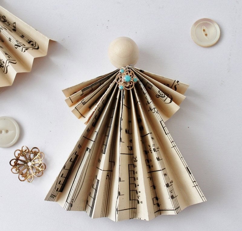 body and head of music paper ornament with neck decoration