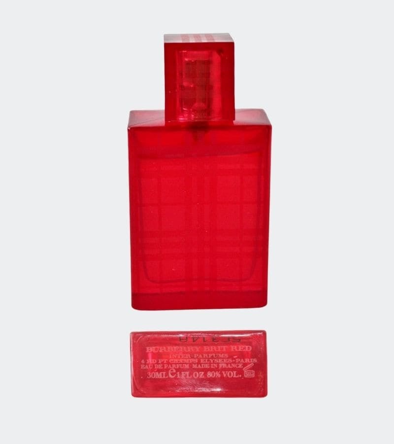 Bottle of red Burberry perfume