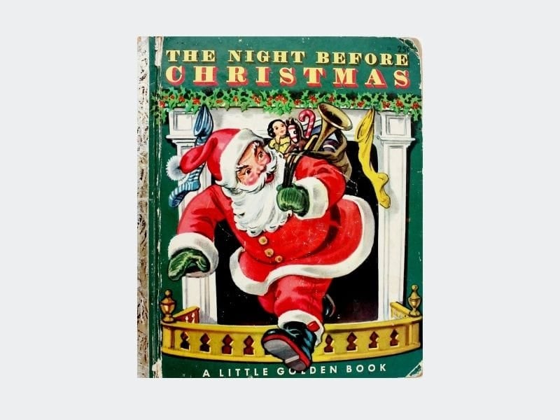 Book with santa coming out of the chimney on the cover