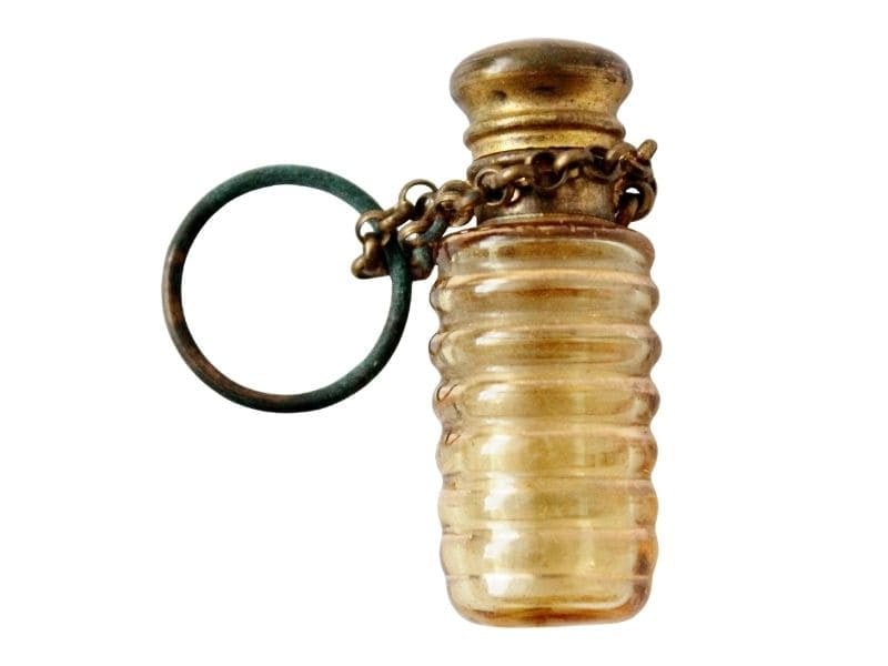 light amber colored small chatalaine perfume bottle