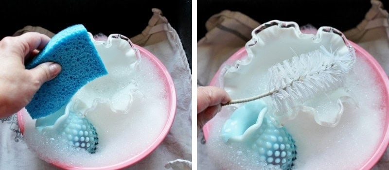 cleaning glassware with 1st a sponge & second a bottle brush