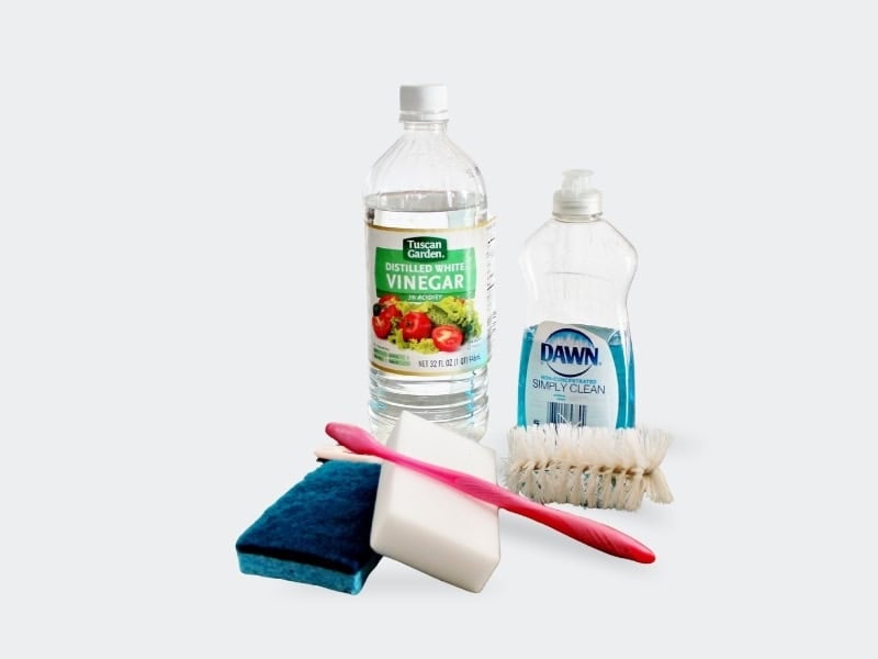 cleaning supplies: vinegar, dawn, sponges, toothbrush, bottle brush