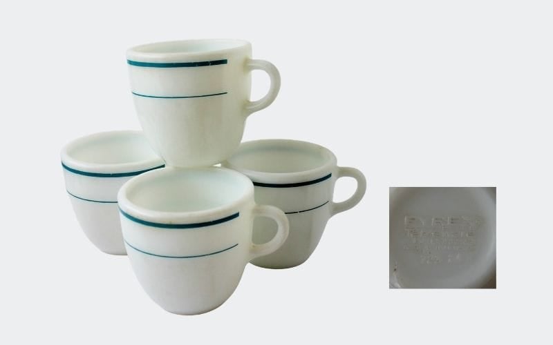 4 white mugs with aqua blue stripes near rim