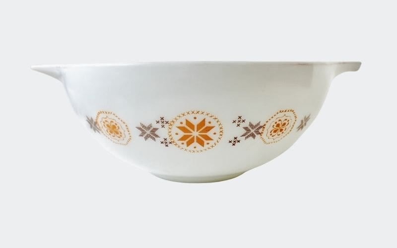 large white glass bowl with orange and gray star decoration