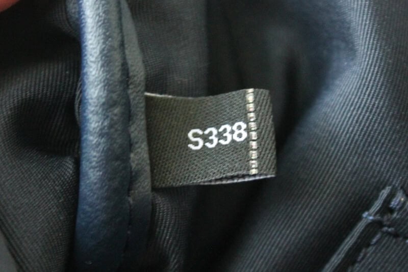 S338 tag inside kate spade tote