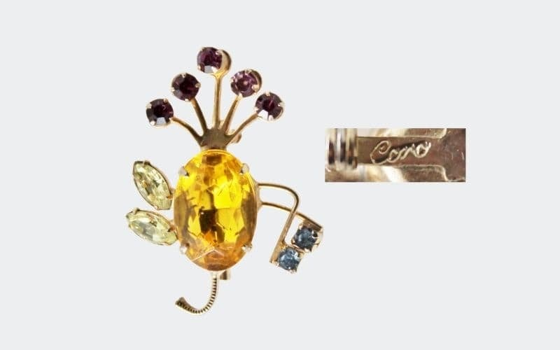 Bug shaped yellow rhinestone pin