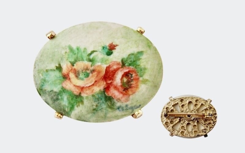 oval pin with painted poppies