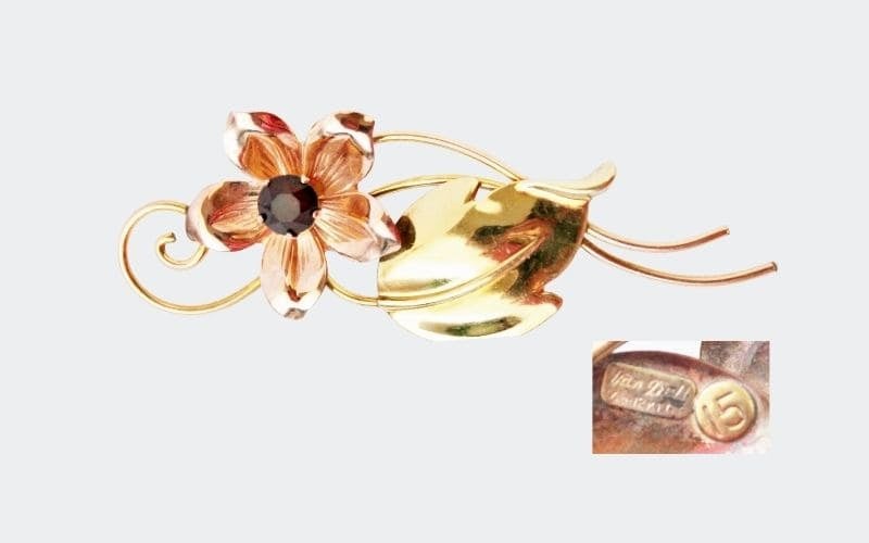 gold floral pin