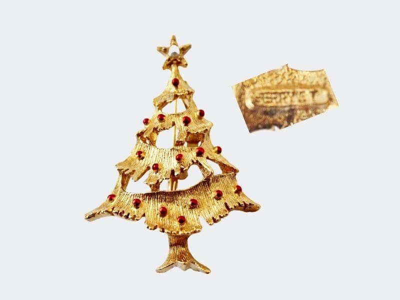 Gold christmas tree pin with red ornaments