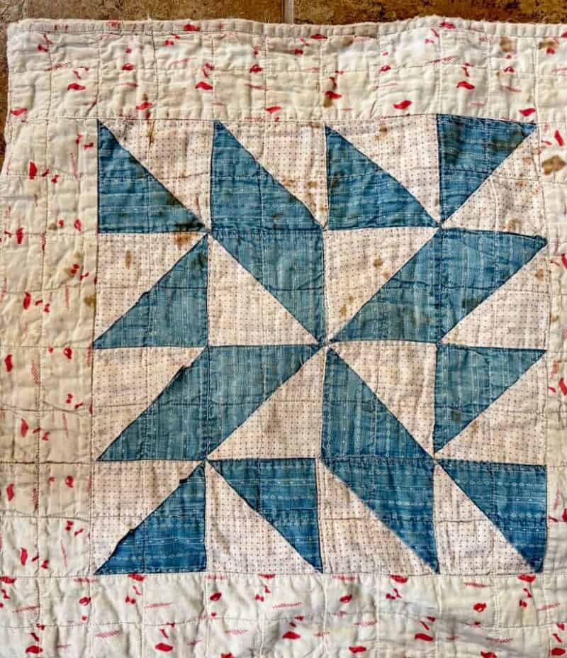 one corner of an antique quilt