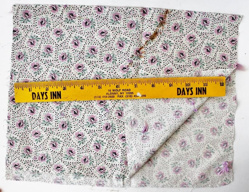 small piece of feed sack fabric with ruler