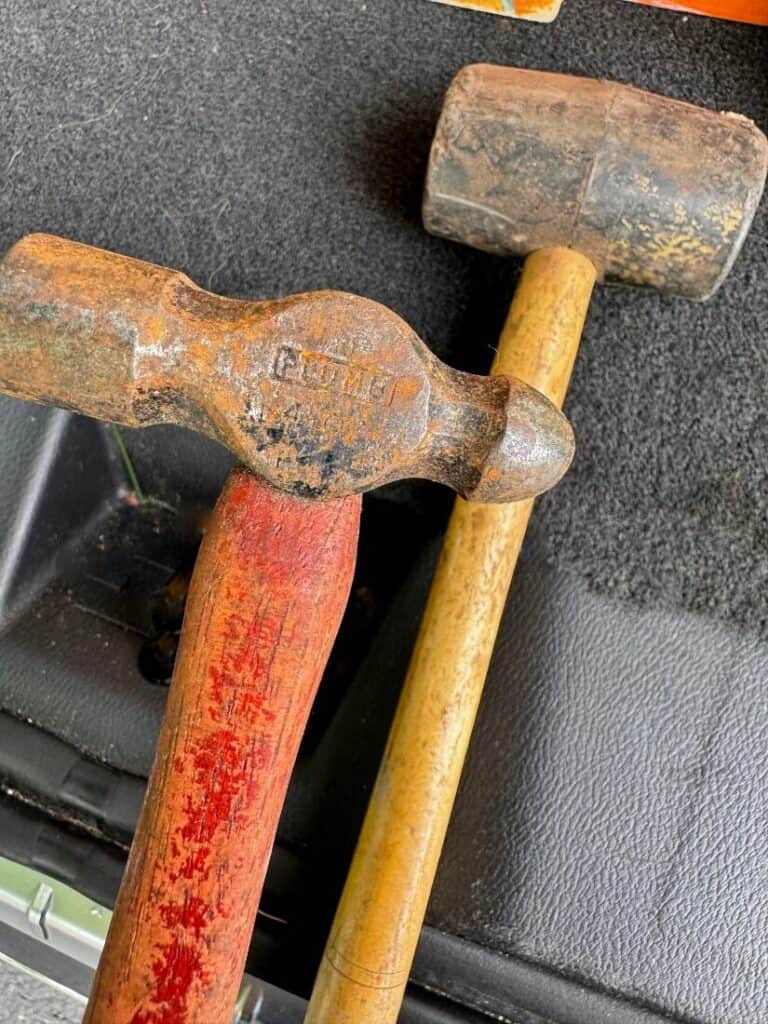 Hammer with red handle and mallet